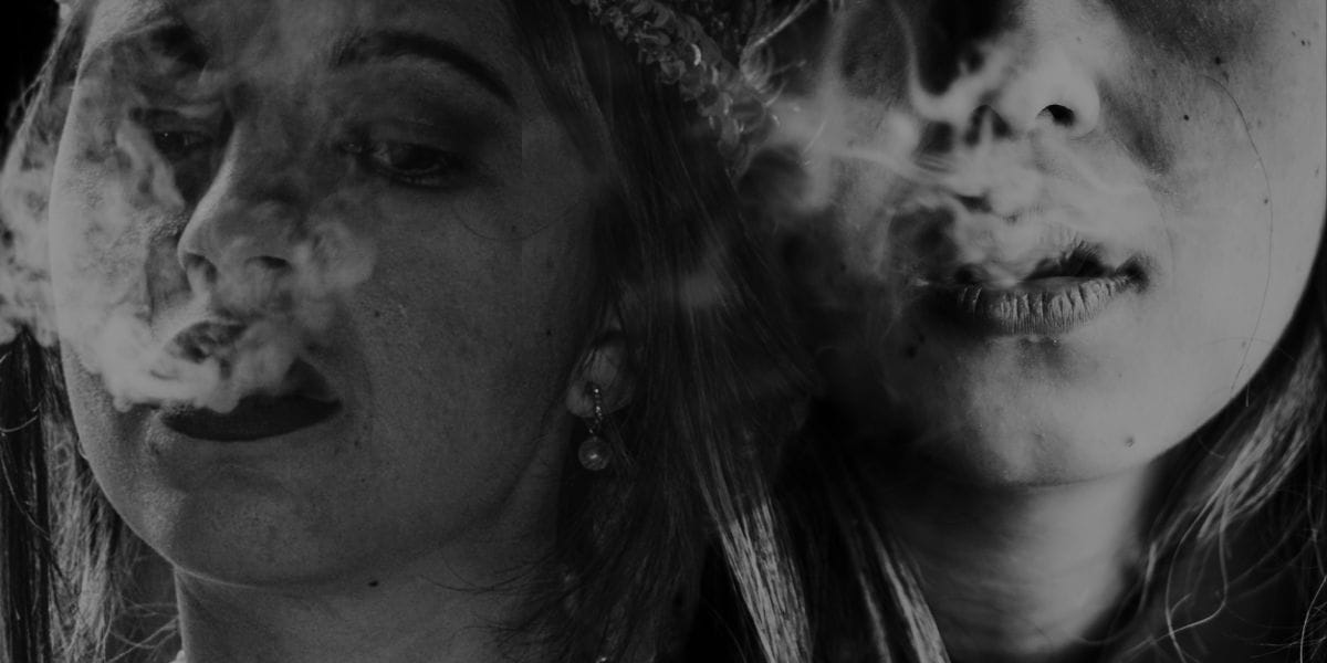 Backhouse Studio  2 women smoking