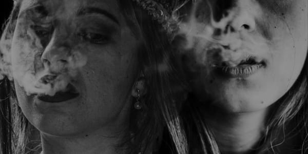 Backhouse Studio  2 women smoking